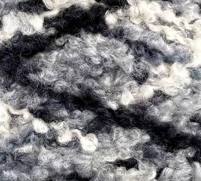 Corallo Bouclé 240m/100g – Merino Extrafine und Seide mit Elastan Schwarz-Weiss Melange